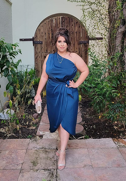 Another reviewer wearing the dress in a classy navy blue shade
