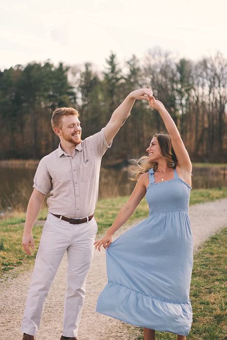 A reviewer modeling the light blue dress