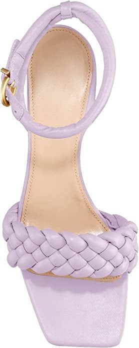 a pair of lilac braided sandals