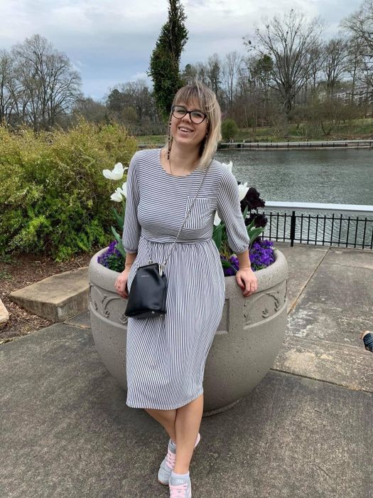 Another reviewer sporting the same black-and-white striped dress.