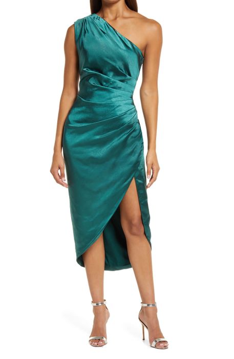 Model showcasing the forest green dress