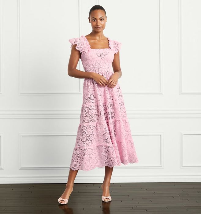 model wearing a pink lace, square-neck, sleeveless midi dress