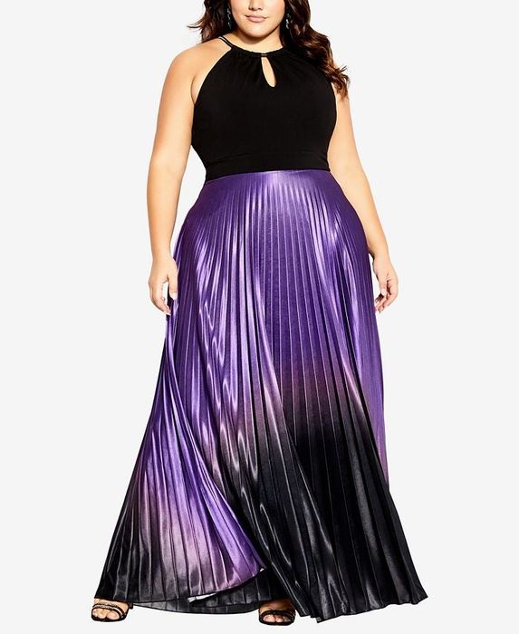 A model showcasing a gown featuring a black halter bodice and a purple ombre pleated skirt.