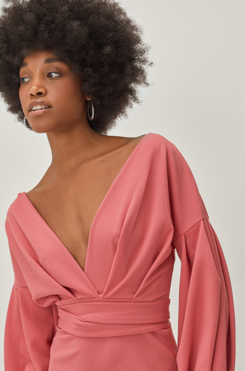 Close-up of the same model in the dress