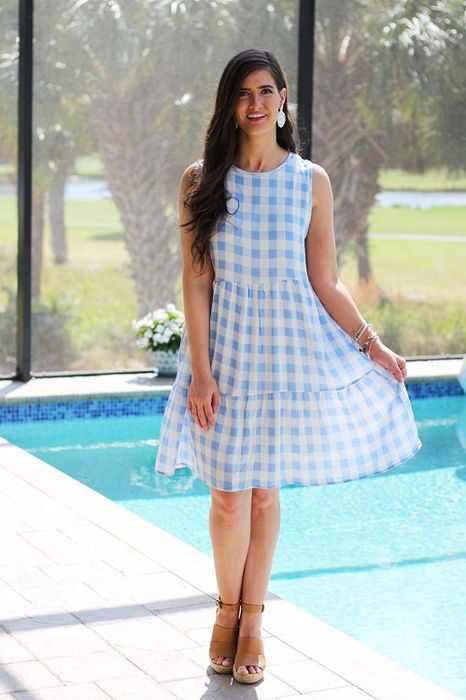 model showcasing the dress in a blue printed design