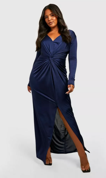 Model wearing the twist-front dress in navy