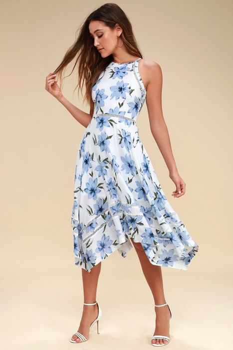 model wearing a beautiful blue floral midi dress