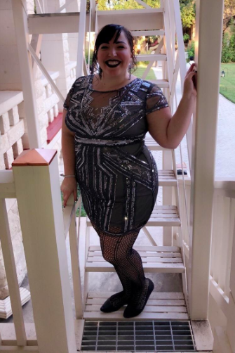 Reviewer in the silver version of the dress