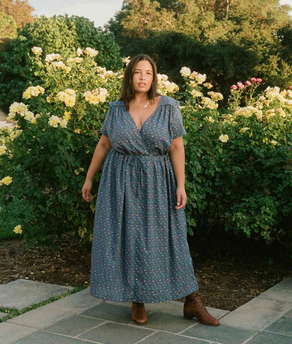 model wearing a V-neck dress