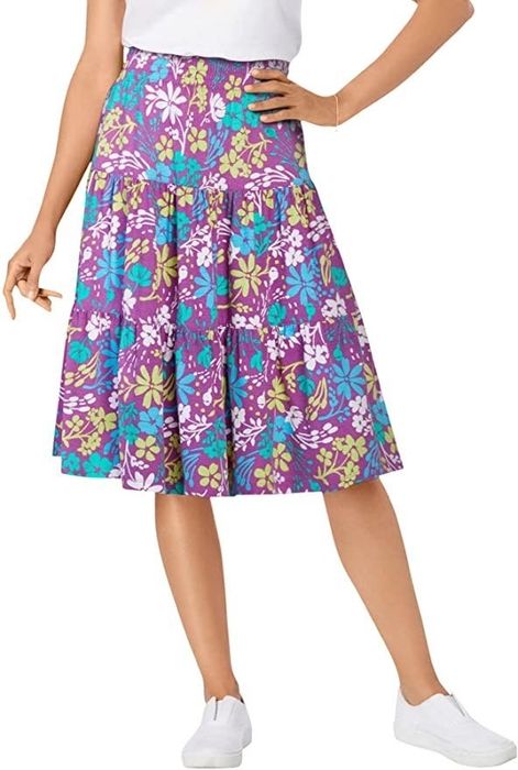 The tiered skirt in purple featuring a blue and green floral print