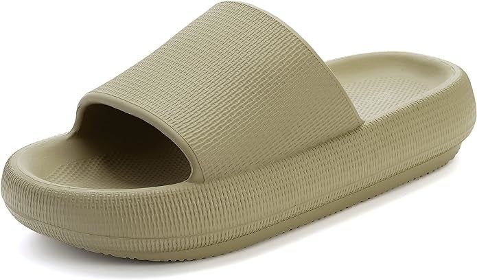 Plush, textured slide sandal with a thick sole for maximum comfort, highlighted in a shopping-focused article