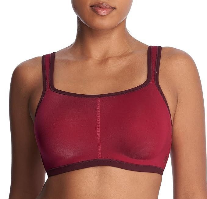 Model wearing the red sports bra