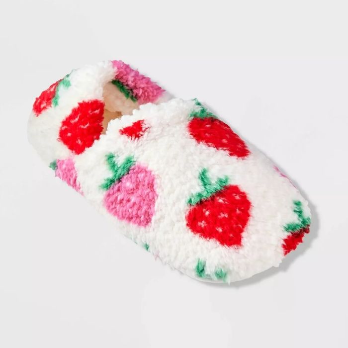 Fluffy slippers with a strawberry design, perfect for lounging around the house.