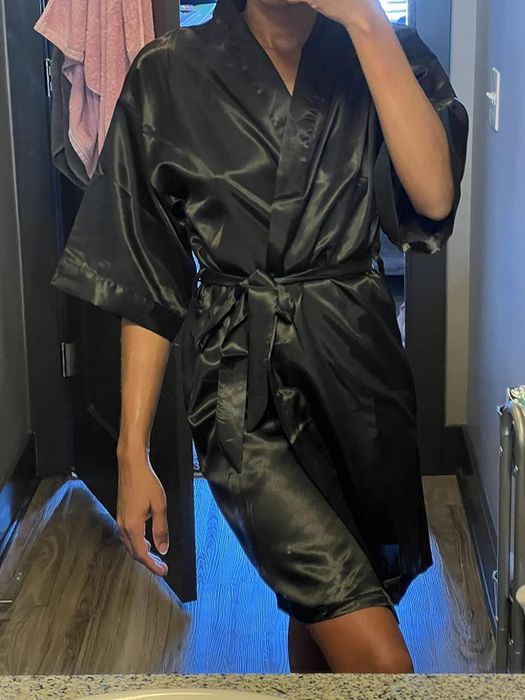 A reviewer wearing the black robe