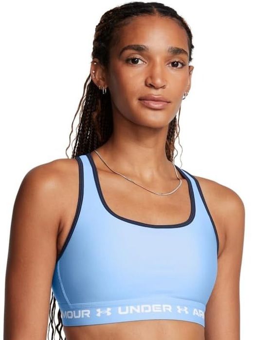 A model is showcasing the blue bra in the image.