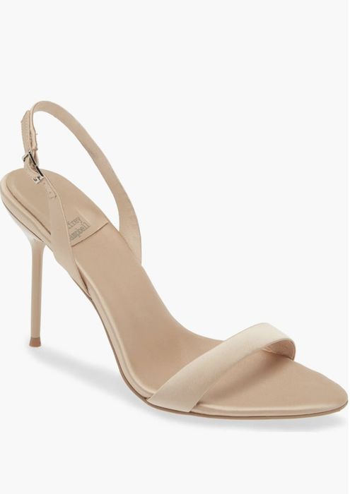 A sophisticated high-heeled sandal with a minimalist strap and stiletto heel, ideal for formal occasions