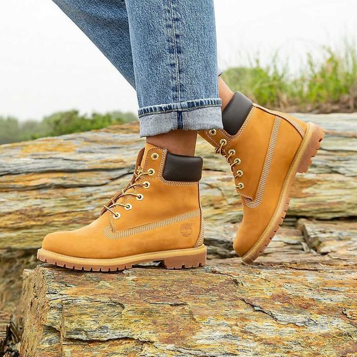 A model wearing the yellow Timberland boots