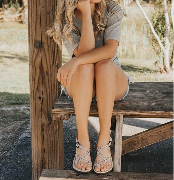 A model wearing elegant strappy sandals