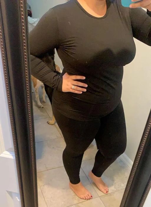 Reviewer wearing the black thermal set