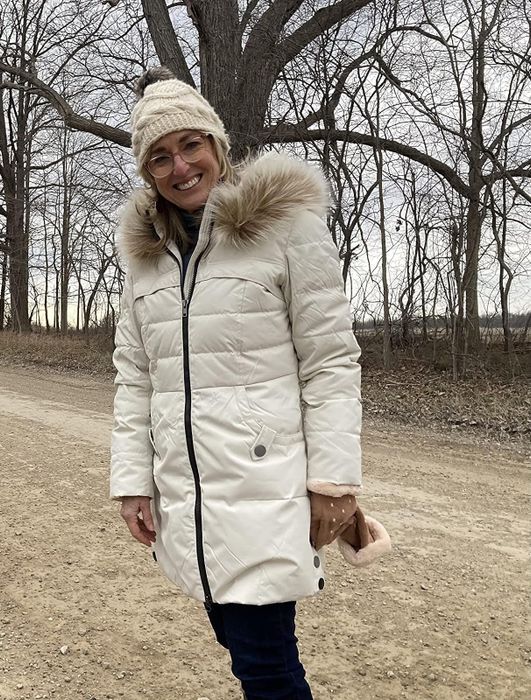 Reviewer sporting the jacket in white