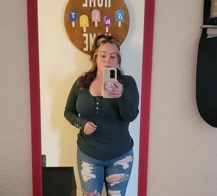 A reviewer wearing the green shirt