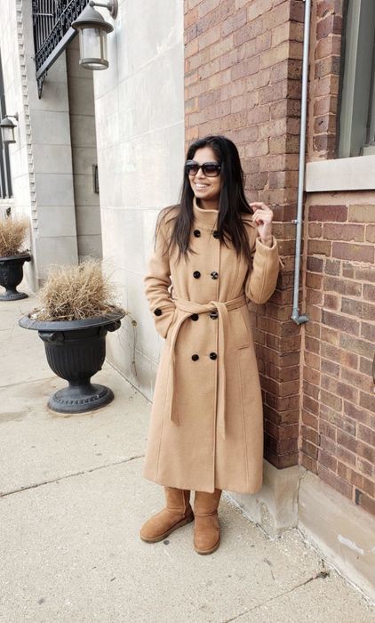 Another reviewer wearing the coat in tan