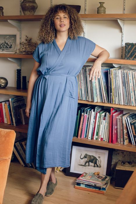 A model showcasing the blue dress