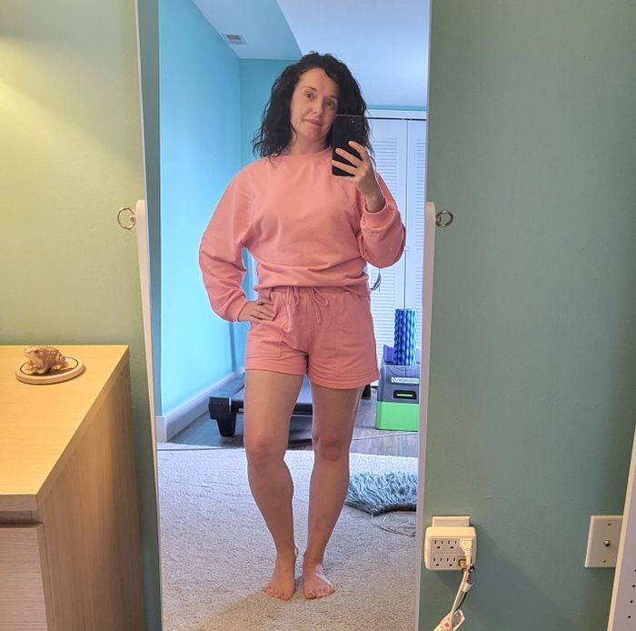 reviewer modeling the pink lounge set
