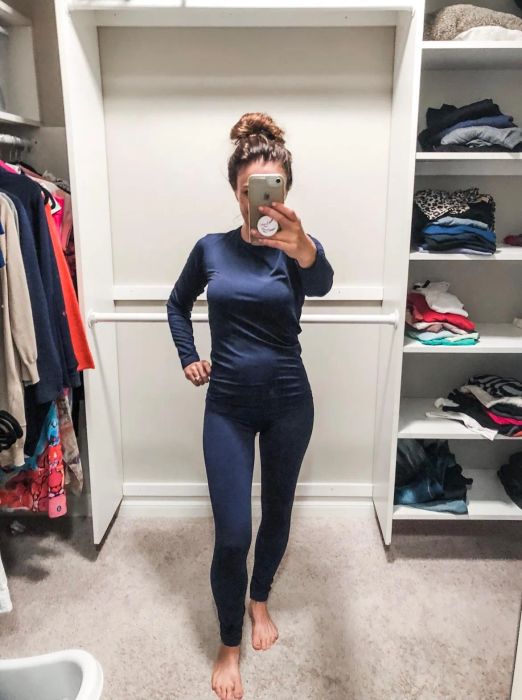 Reviewer wearing the navy blue thermal set
