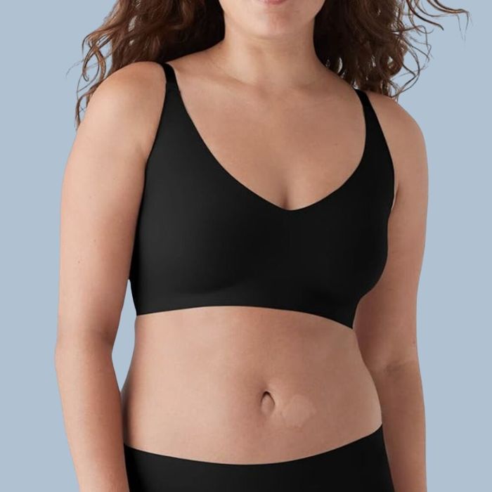 A model showcasing the black bra