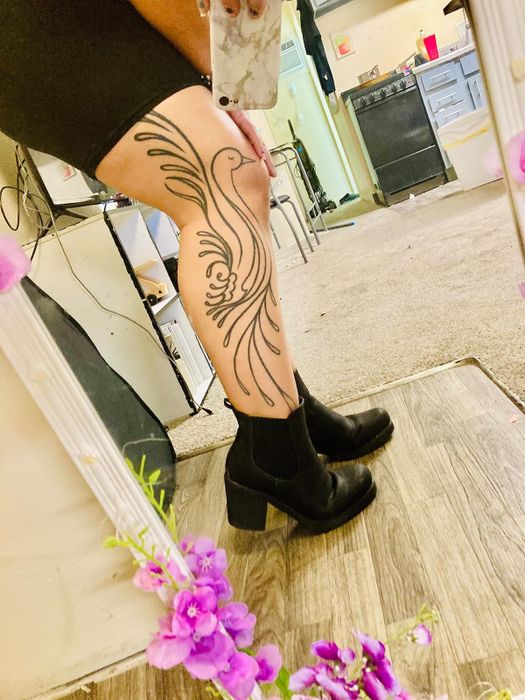 Reviewer showcasing the black boots