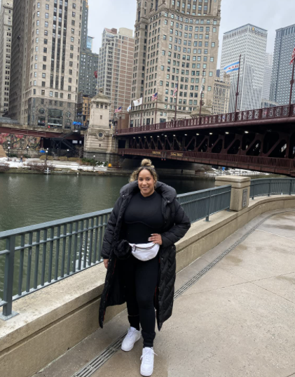 Reviewer rocking a black maxi puffer coat