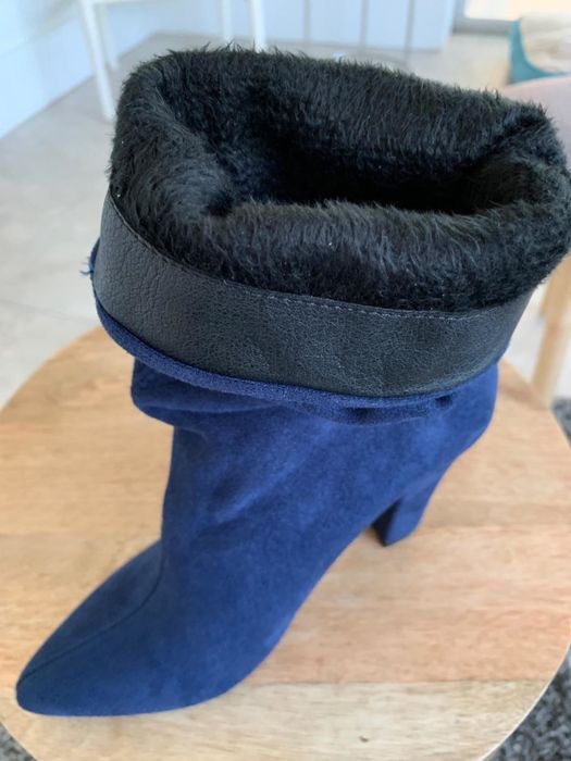 blue version rolled down to reveal the cozy lining