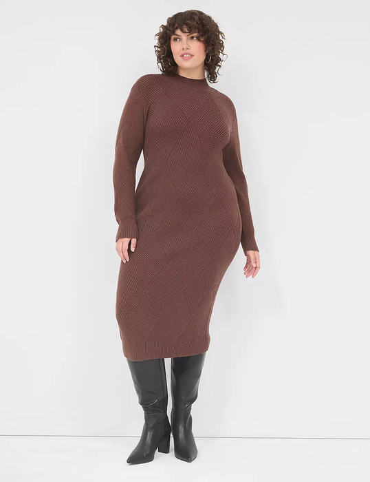 A model wearing a ribbed knit midi dress paired with knee-high boots.