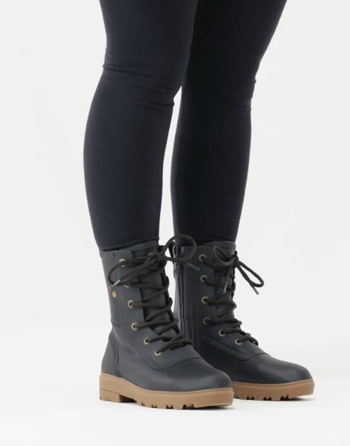 Model wearing the black boots