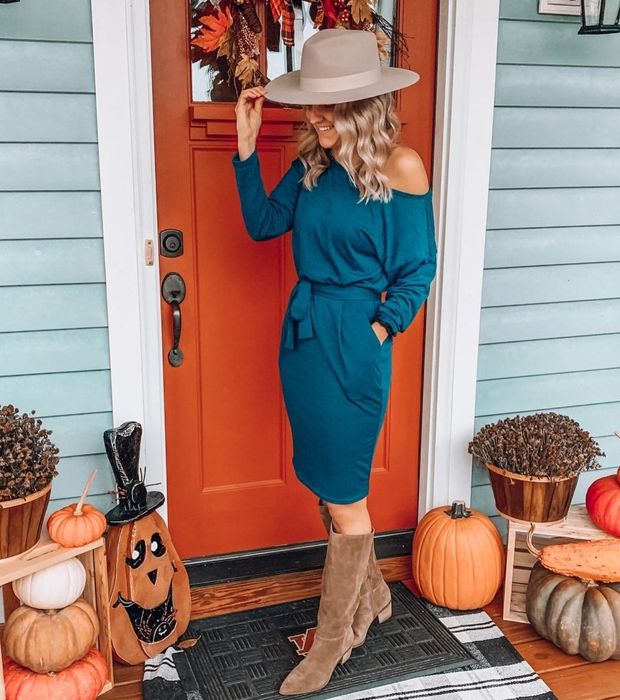 Reviewer showcasing the blue dress