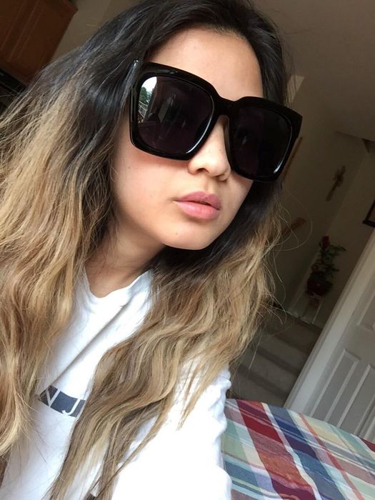 another reviewer showcasing the sunglasses