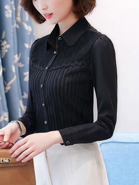 model styling the black button-down