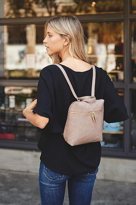 model styling the dusty pink bag