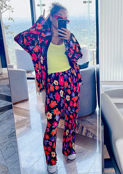another reviewer styling the multicolored floral print set with a yellow top underneath