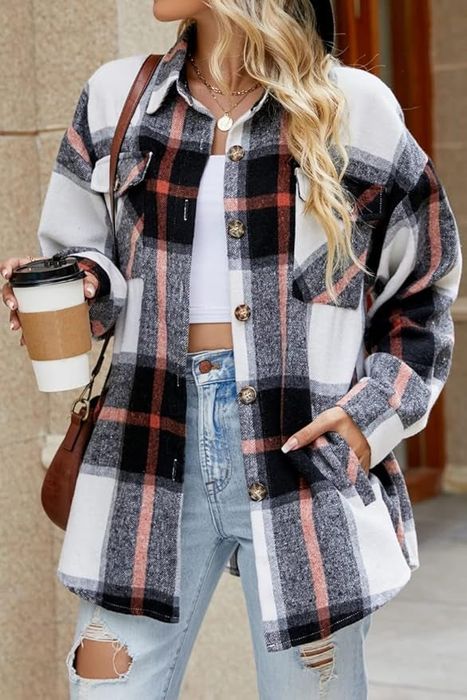 A model showcasing a plaid shirt.