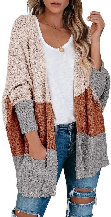 A model wearing the cardigan in a deep, warm z-brown shade.