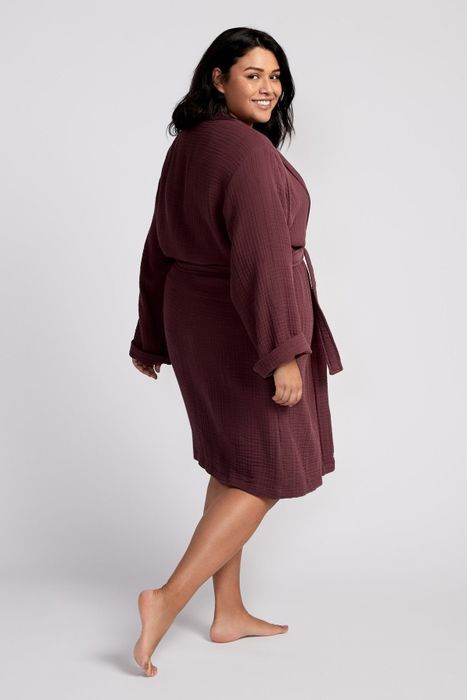 Another model dressed in the robe, now in mulberry tone.