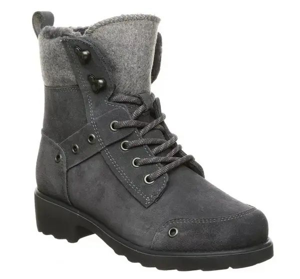 Gray winter boot featuring a lace-up front and cozy lining