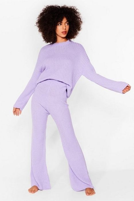 The same model flaunting the set in a calming lavender hue