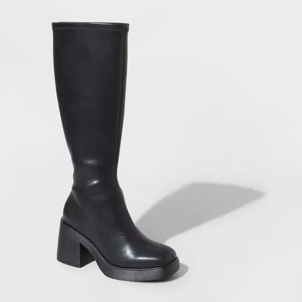 Black wide-calf boot with a heel.