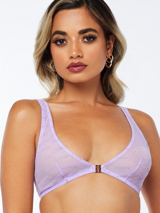 Another model is wearing the light lavender bralette.