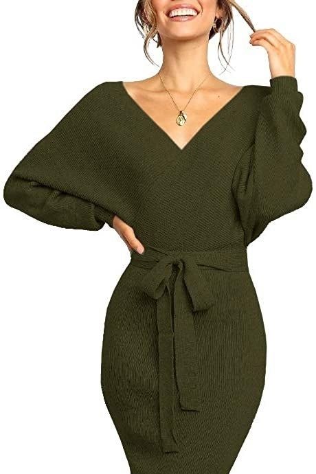 A front view of a model wearing the dress in army green.
