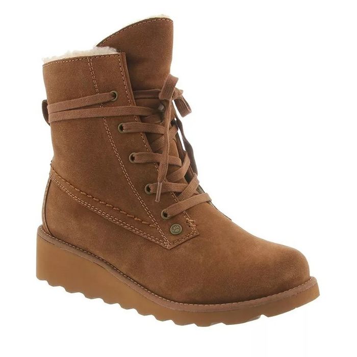 Brown lace-up boot featuring a cuff, perfect for winter