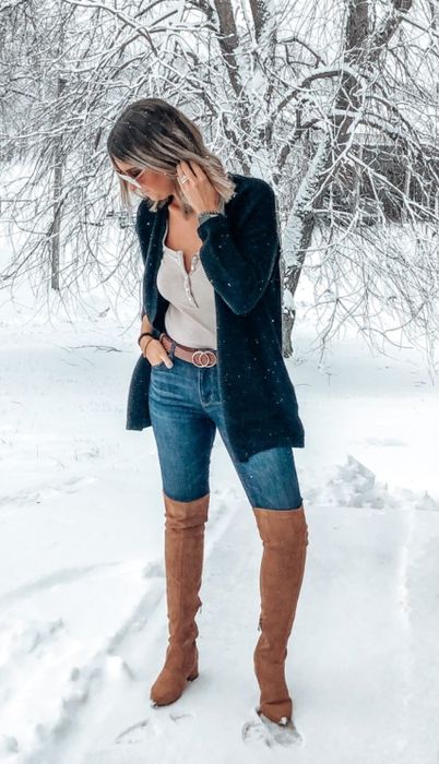 Another reviewer wearing the boots in a rich brown shade.